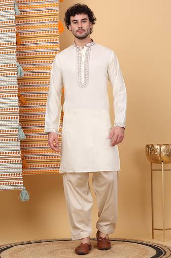 Men linen ethnic motifs embroidered cream kurta with beige salwar
