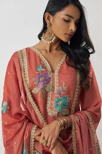 Orange fancy crust top embroidered salwar suit