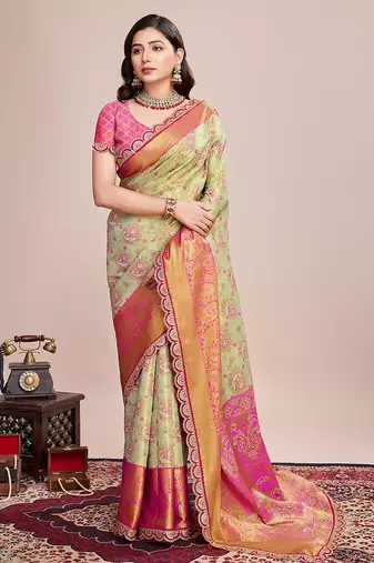green kanjivaram silk blend saree with blouse