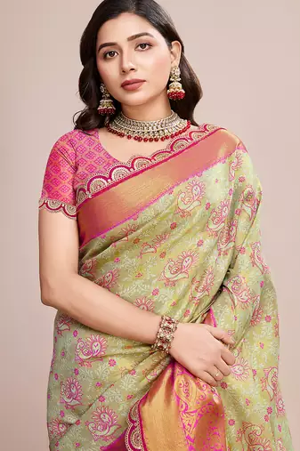 green kanjivaram silk blend saree with blouse