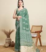 dark green semi cotton sequin saree