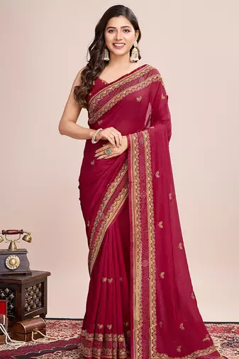 maroon silk blend saree with contrast zari border pallu and matching blouse