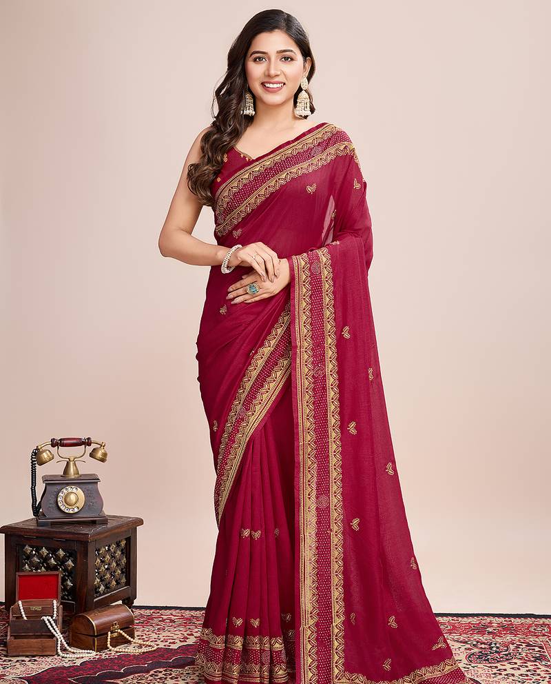 maroon silk blend saree with contrast zari border pallu and matching blouse