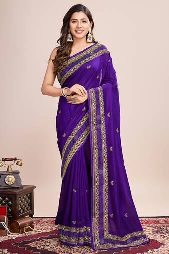 purple silk blend saree with contrast zari border pallu and matching blouse