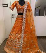 orange zari work silk lehenga choli with net dupatta