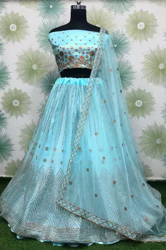 blue embroidered net engagement wear lehenga choli