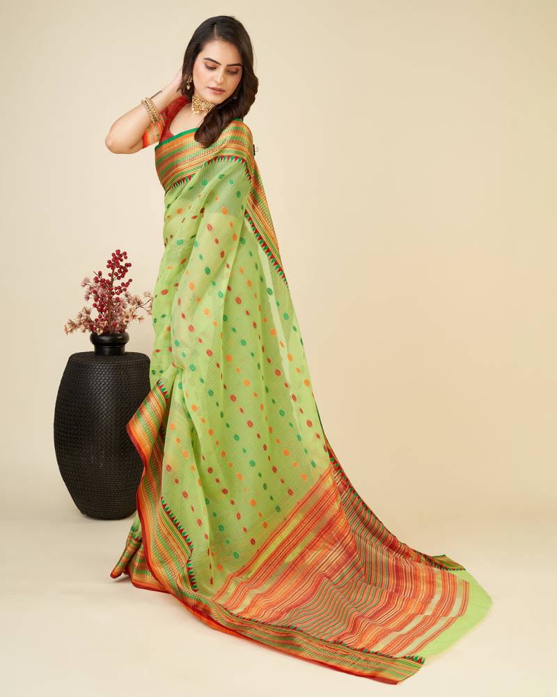 green silk blend contrast zari border saree with matching blouse