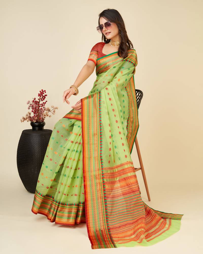 green silk blend contrast zari border saree with matching blouse