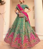 teal green sequins embroidered banarasi silk lehenga choli
