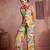 Elegant green muslin cord set with vibrant floral print
