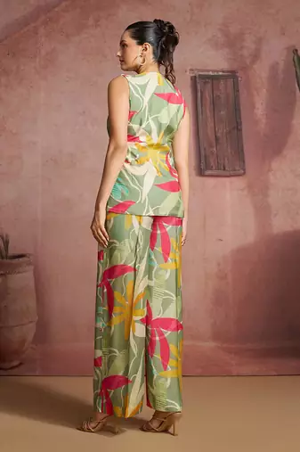 Elegant green muslin cord set with vibrant floral print