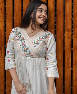 off-white cotton Kurti designed with floral embroidery and crochet lace detailing 4