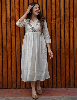 off-white cotton Kurti designed with floral embroidery and crochet lace detailing 5
