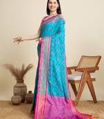 blue patola silk blend saree with contrast weave meenakari & tassels
