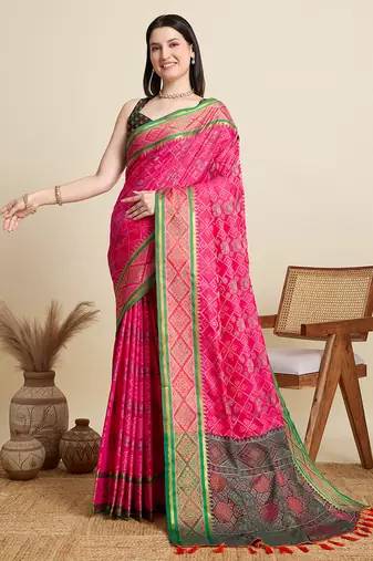 pink patola silk blend saree with contrast weave meenakari & tassels