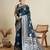 turquoise satin saree with contrast zari border and blouse
