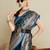 turquoise satin saree with contrast zari border and blouse