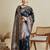 navy blue satin saree with contrast zari border and blouse