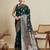 green satin saree with contrast zari border and blouse