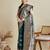 green satin saree with contrast zari border and blouse