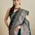 green satin saree with contrast zari border and blouse