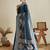 blue satin saree with contrast zari border and blouse