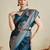 blue satin saree with contrast zari border and blouse