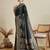 green satin saree with contrast zari border and blouse