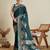 green satin saree with contrast zari border and blouse