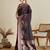 wine satin saree with zari motifs contrast border and blouse