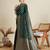 green satin saree with zari motifs contrast border and blouse