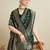 green satin saree with zari motifs contrast border and blouse