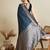navy blue satin saree with zari motifs contrast border and blouse