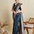 navy blue satin saree with zari motifs contrast border and blouse