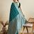 turquoise satin saree with zari motifs contrast border and blouse