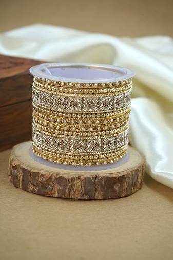 Sparkle gold & pearl studded bangle set