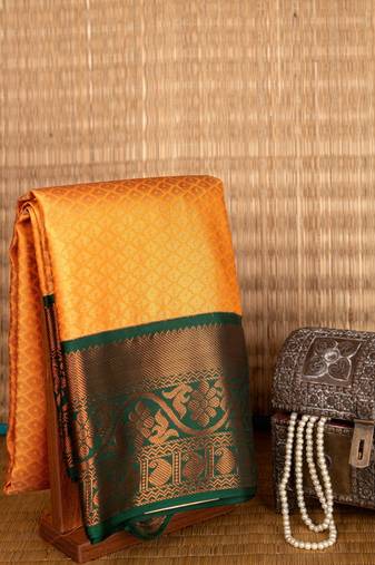 Dual tone orange korvai semi silk saree