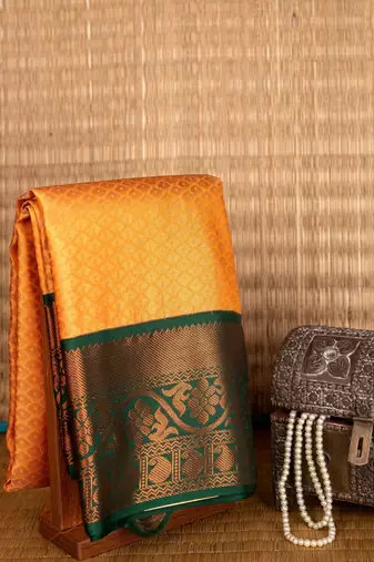 Dual tone orange korvai semi silk saree