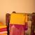 Mustard golden zari motifs semi silk saree