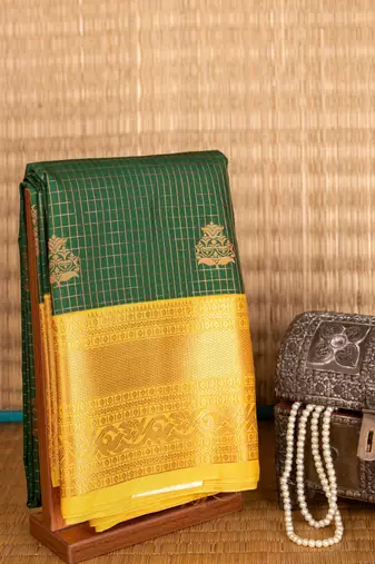 Mustard and green brocade semi silk saree