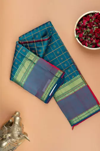 Peacock green floral motifs silk cotton saree