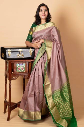 Pastel chocolate intricate gold zari silk saree
