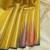 Golden multi colour temple tissue silk saree