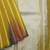 Golden multi colour temple tissue silk saree