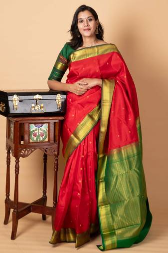Red and green small border silk saree