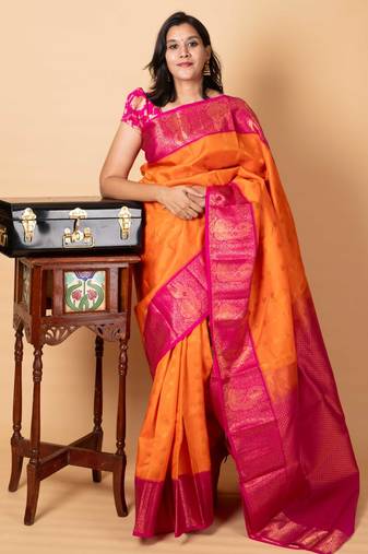 Orangish pink kanchipuram silk saree