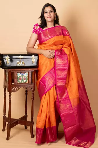 Orangish pink kanchipuram silk saree
