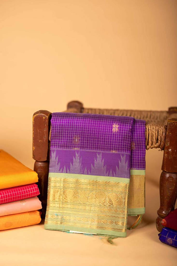 Pastel green and purple silk cotton saree