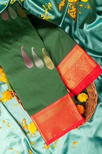 Bottle green and red semi silk saree