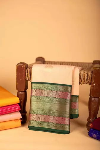 Offwhite and green semi silk saree